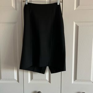 Woman’s black dressy skirt.  Great staple piece for work or night out.